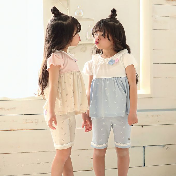 日本 ZOOLAND - 滿版蝴蝶結蕾絲滾邊短褲-貝殼口袋-淺藍