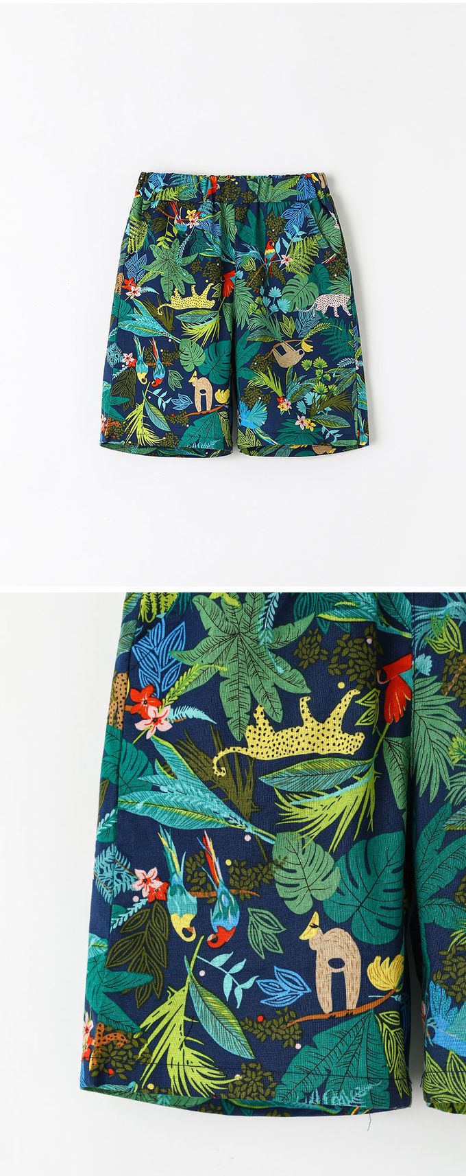 韓國 OZKIZ - 鬆緊腰熱帶叢林動物印短褲-深藍X綠