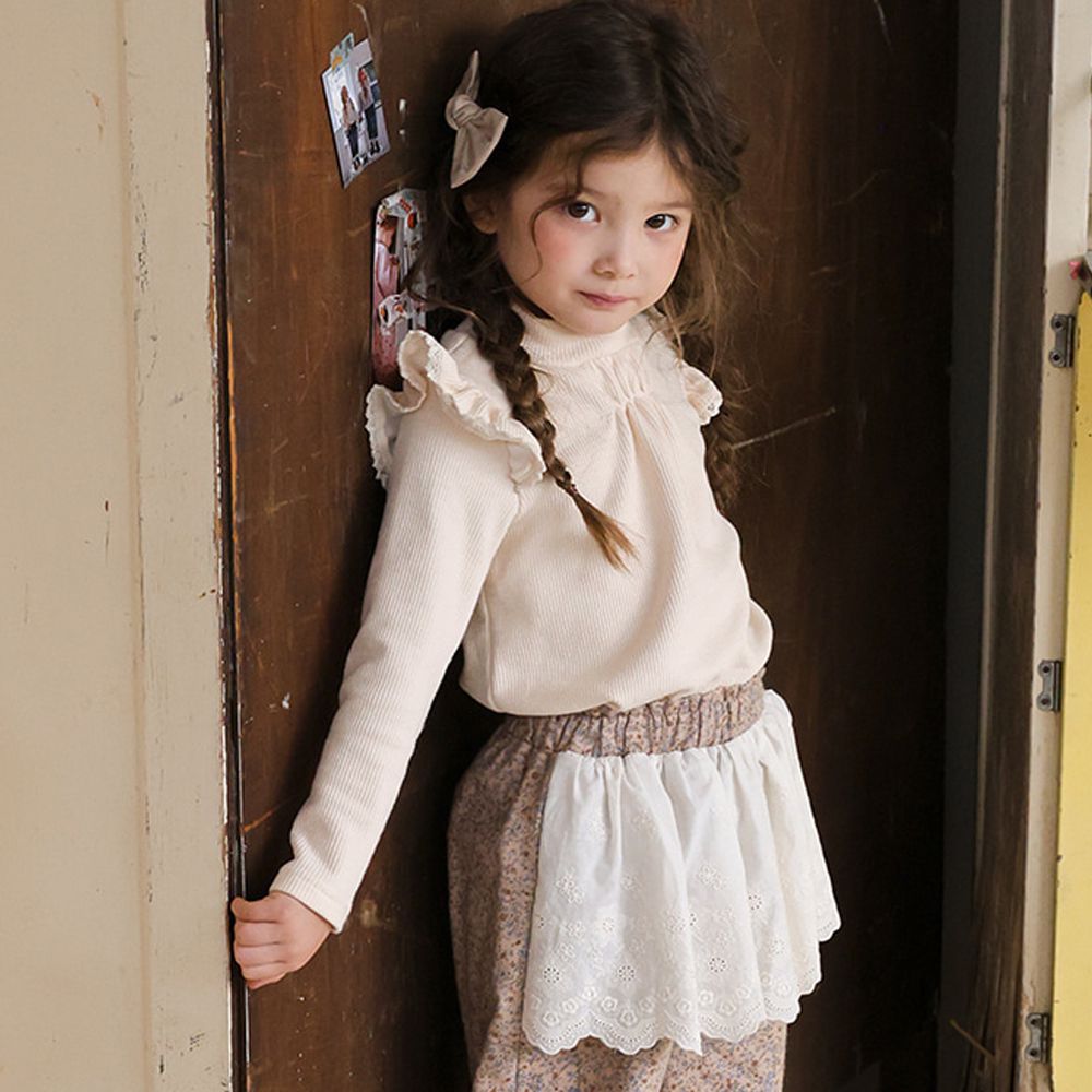 Puellaflo 胸前抓褶小翅膀裝飾彈性長袖上衣-米白