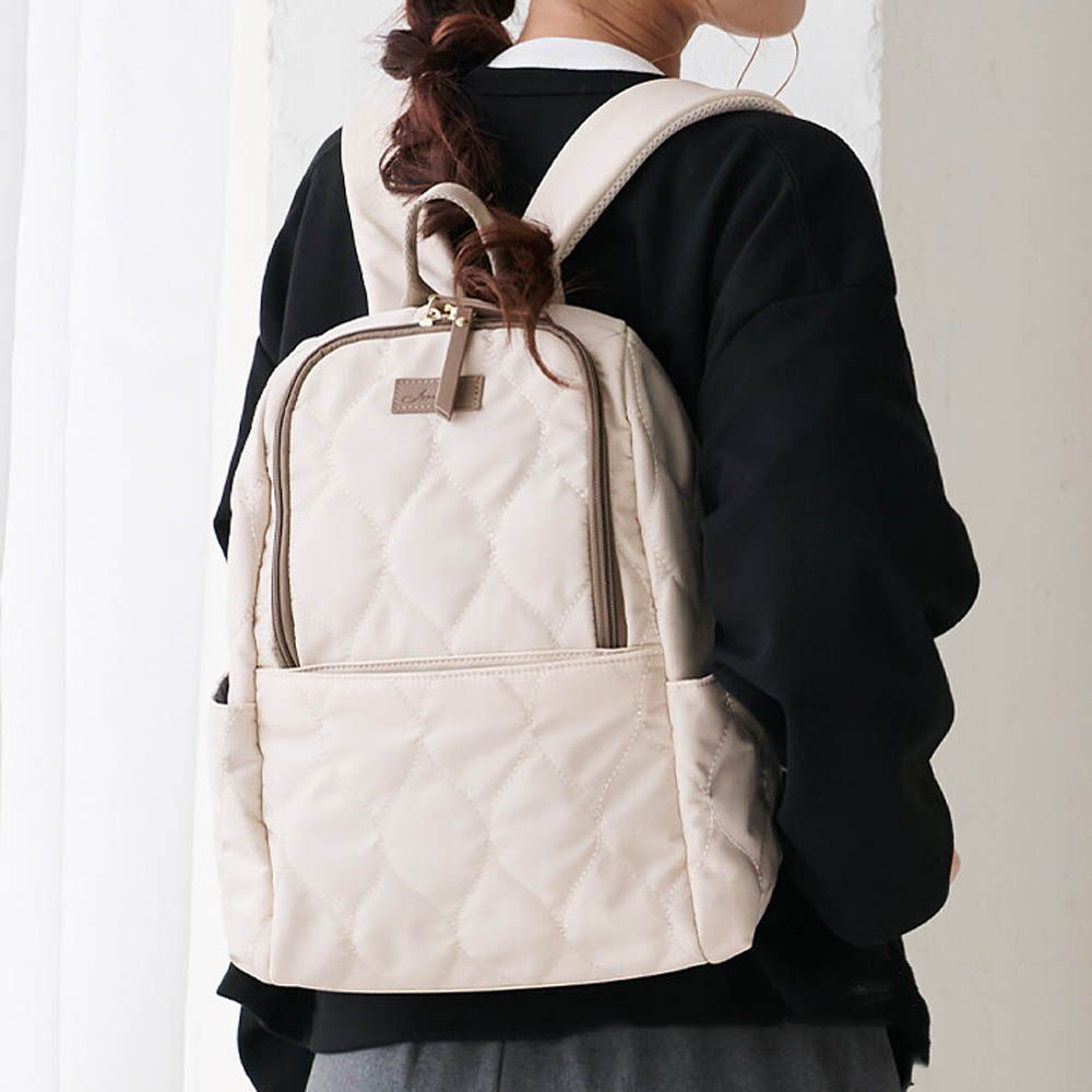 8口袋輕量絎縫防潑水時尚後背包-米杏