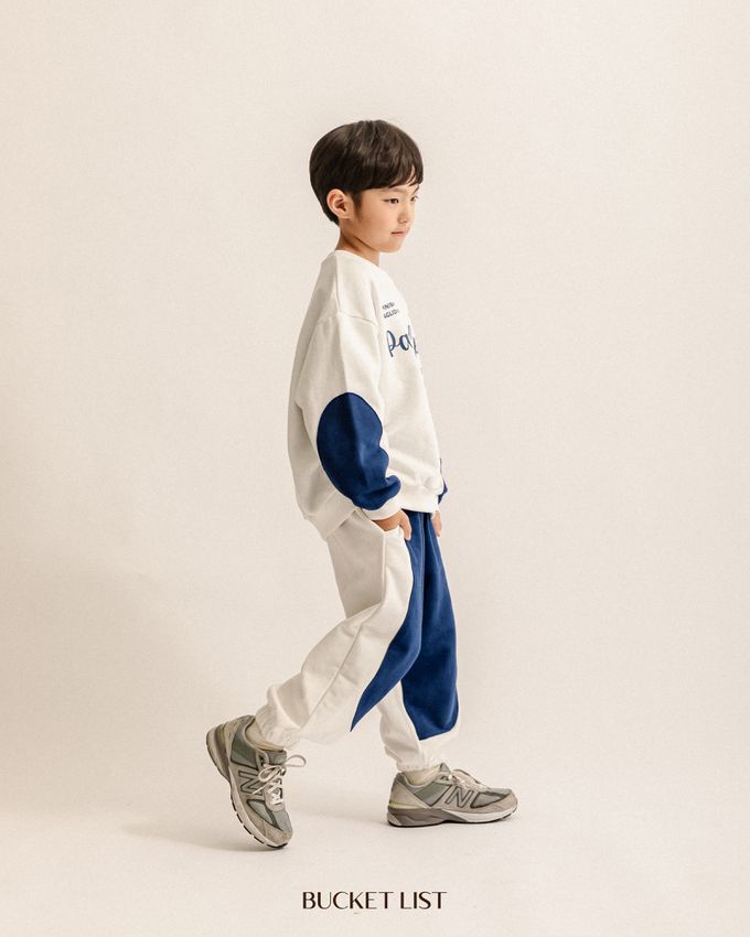 韓國 BUCKET LIST - 鬆緊腰撞色休閒縮口長褲-象牙白X深藍