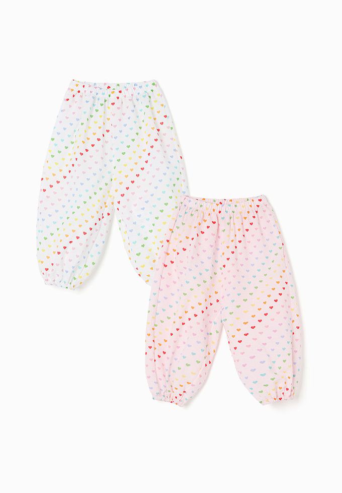 韓國 OZKIZ - 鬆緊腰滿版印花縮口防蚊褲-彩色愛心-淡粉