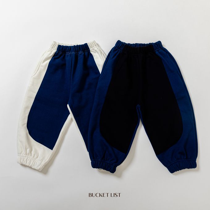 韓國 BUCKET LIST - 鬆緊腰撞色休閒縮口長褲-象牙白X深藍
