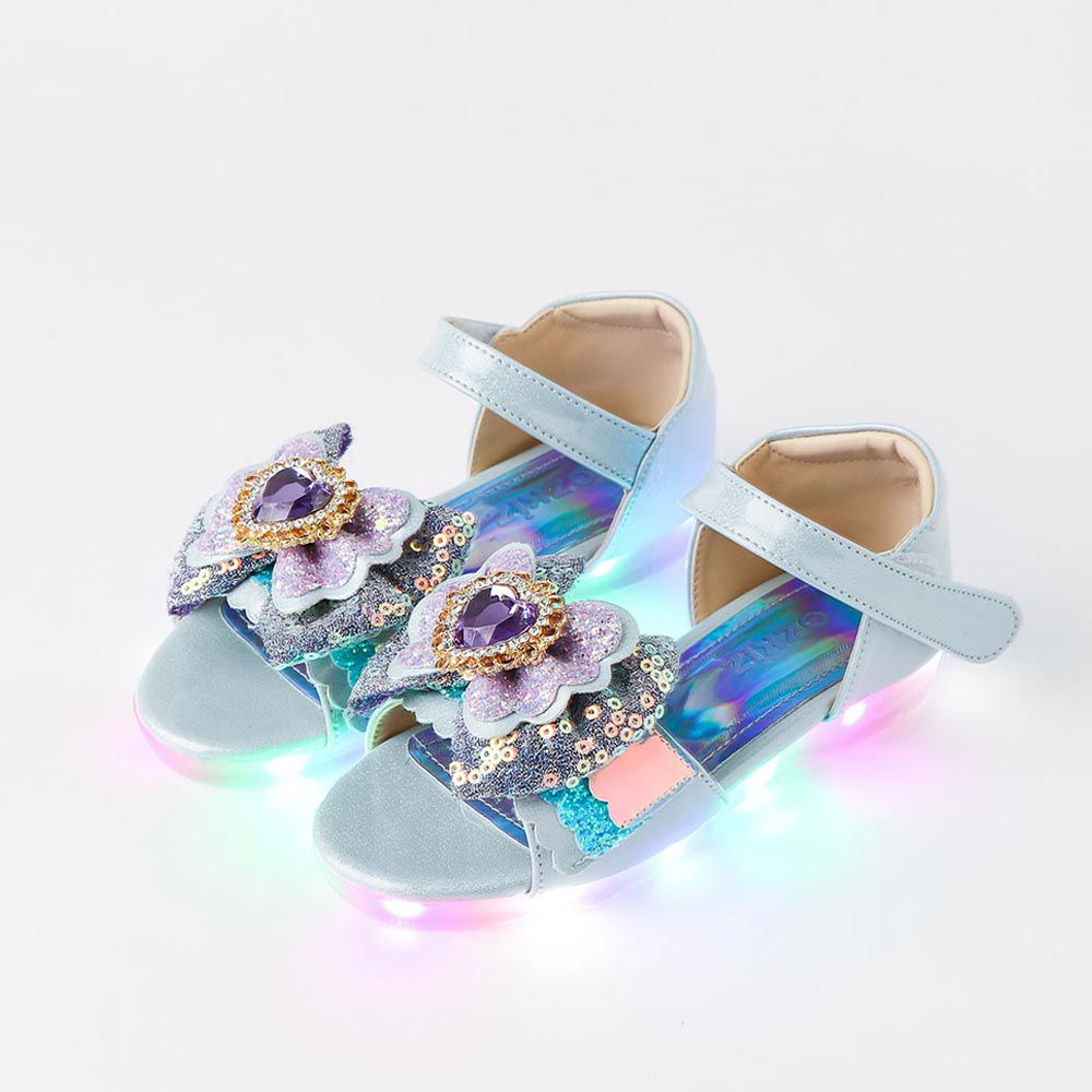 韓國 OZKIZ - (LED)立體愛心寶石蝶結涼鞋-天藍