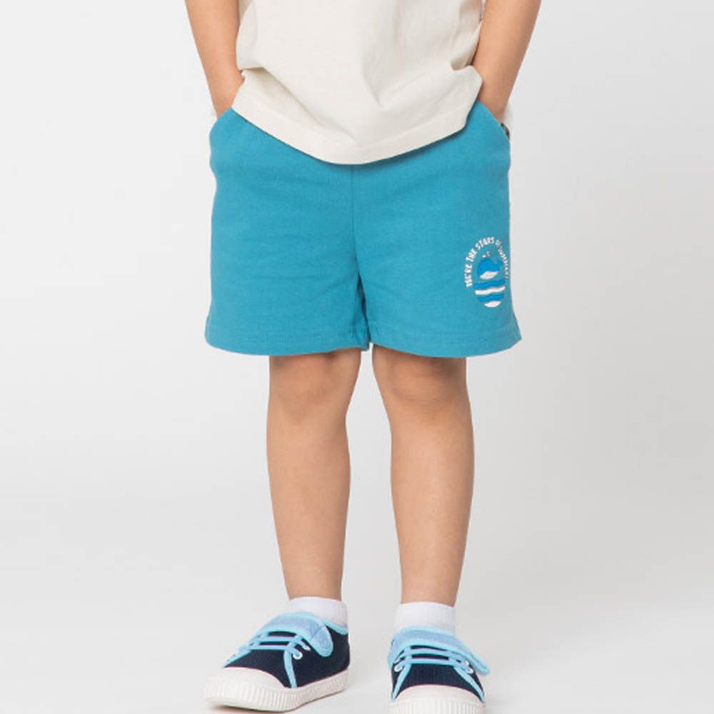 鬆緊腰噴水鯨魚印花短褲-藍綠