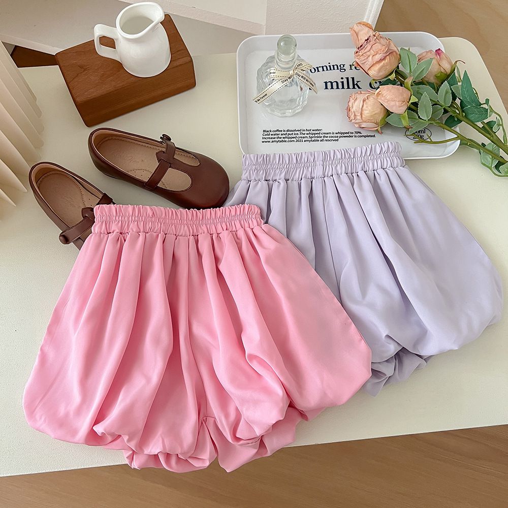 腰鬆緊顯瘦休閒花苞短褲-黑色