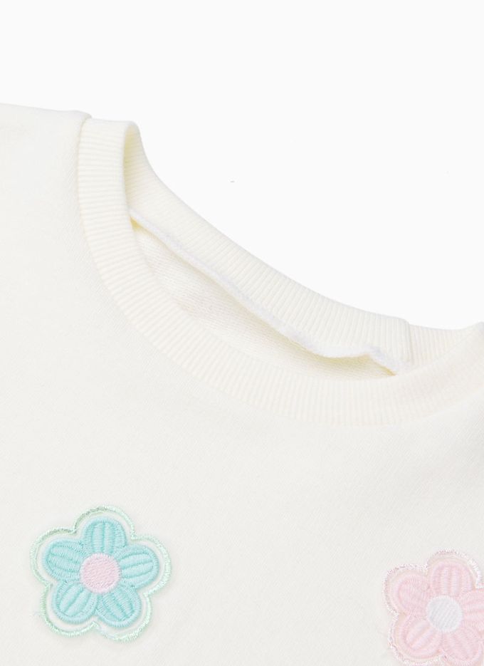 韓國 OZKIZ - 清爽圓花點綴澎澎袖上衣-象牙白