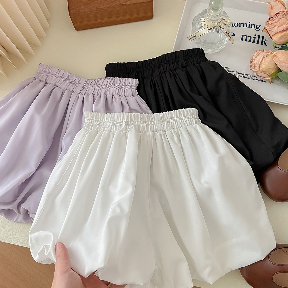 腰鬆緊顯瘦休閒花苞短褲-黑色