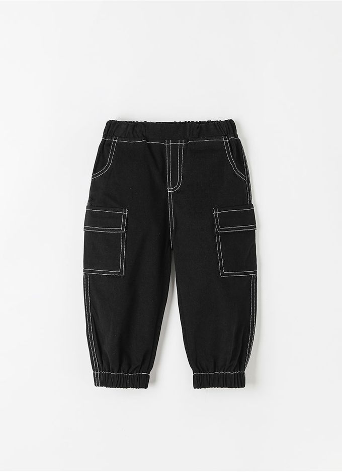 韓國 OZKIZ - 鬆緊腰縫線點綴縮口長褲-象牙白