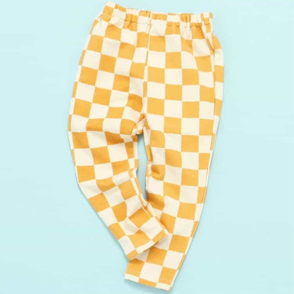 DAISUKI 可愛百搭彈性九分褲-棋盤格-橘黃