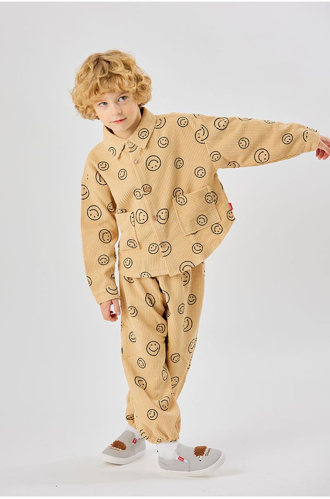 韓國 OZKIZ - 鬆緊腰圓形笑臉印燈芯絨縮口長褲-卡其