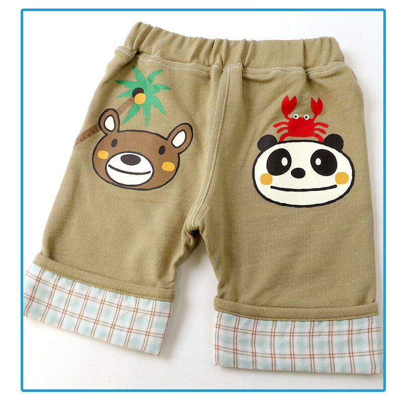 日本 ZOOLAND - 背後童趣印花下擺摺邊短褲-卡其