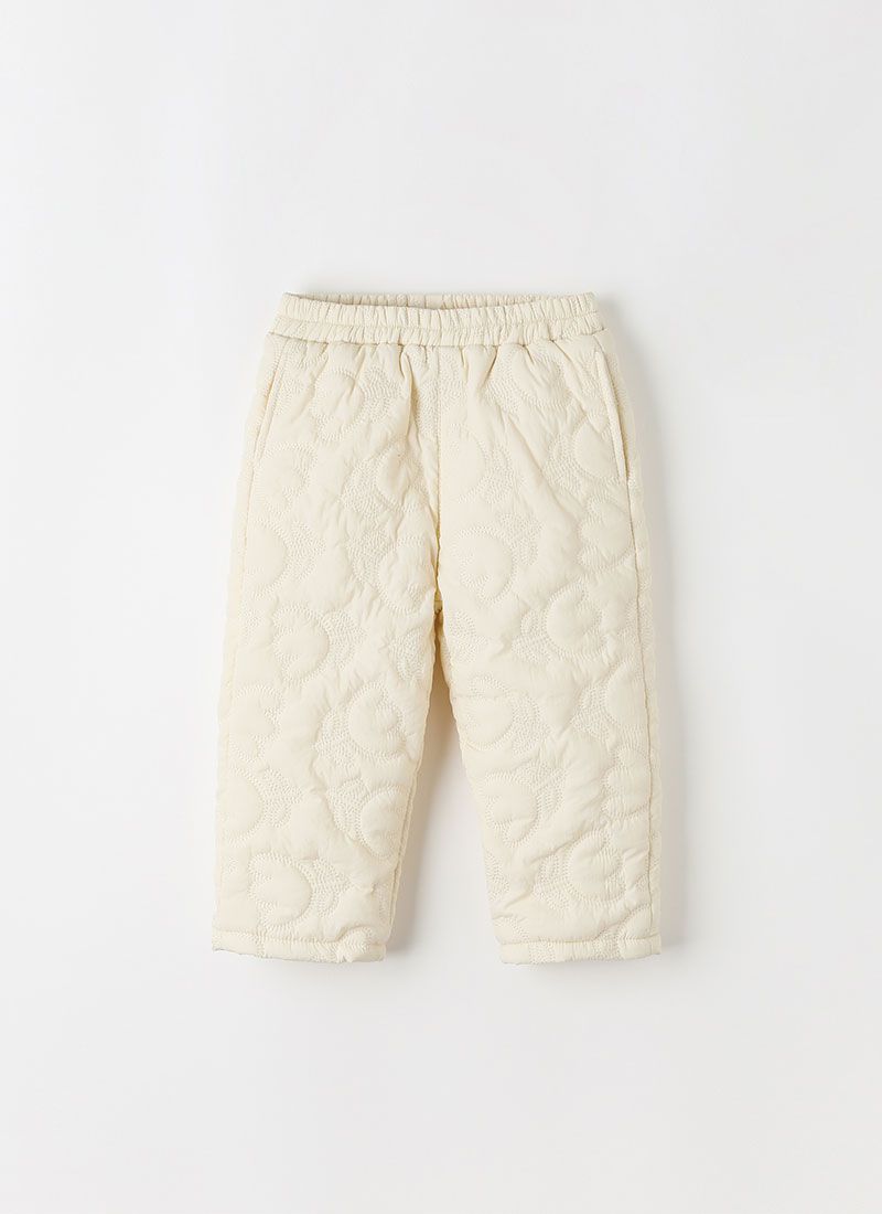 韓國 OZKIZ - 鬱金香縫紋內磨毛長褲-米白