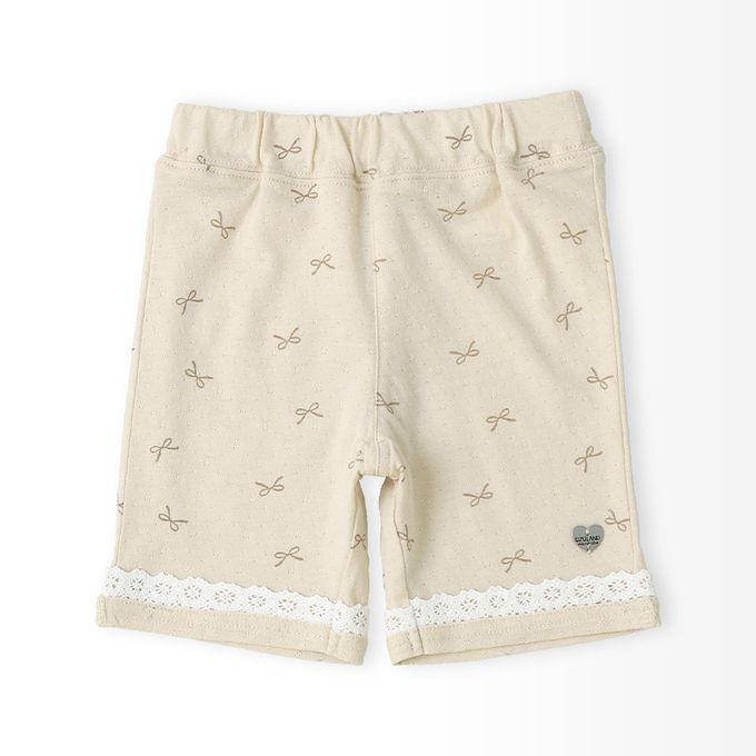 日本 ZOOLAND - 滿版蝴蝶結蕾絲滾邊短褲-貝殼口袋-米杏