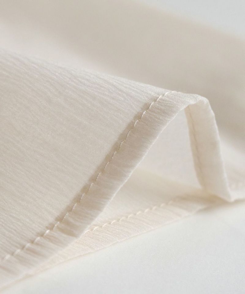 日本 zootie - 空氣感透膚優雅泡泡袖上衣-焦糖棕