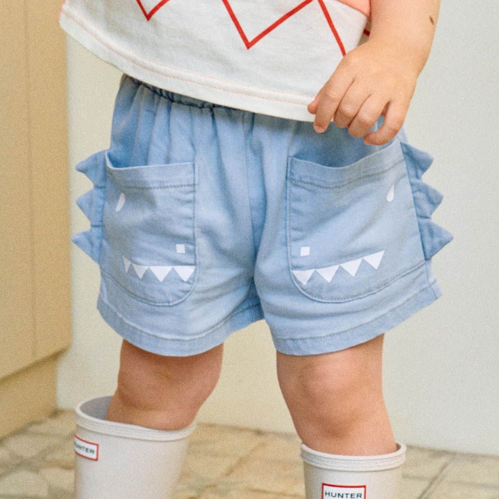 (涼感材質)鬆緊腰角角裝飾口袋短褲-淺藍