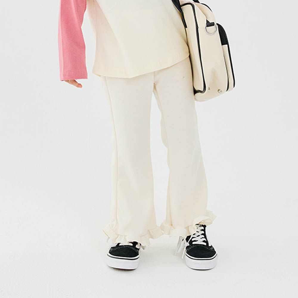 W.S.B. 鬆緊腰荷葉擺拼接小喇叭褲-米