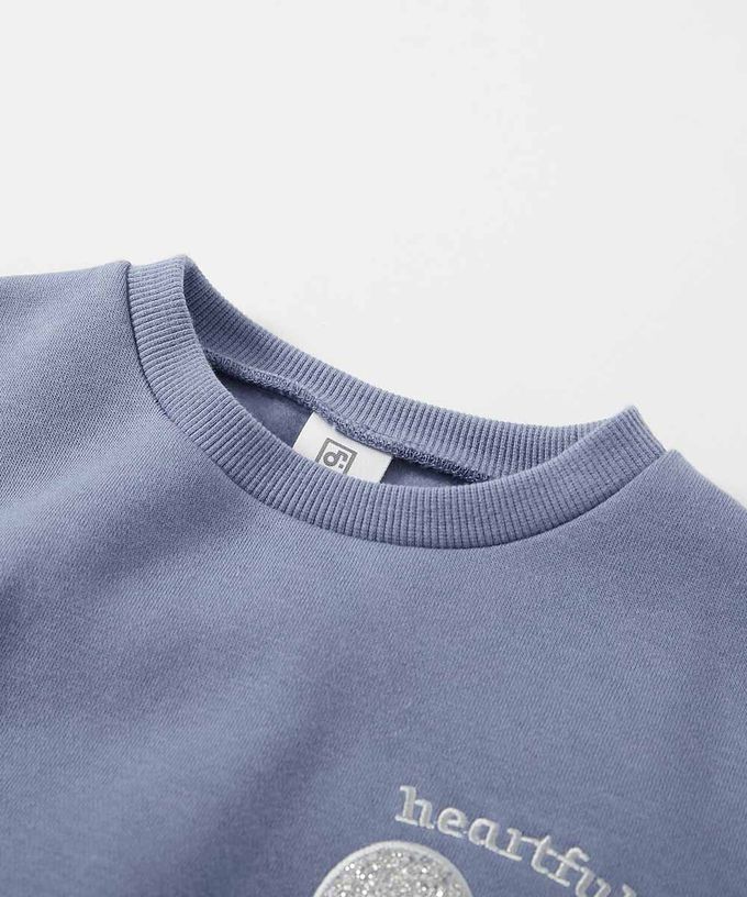 日本 devirock - 閃亮愛心廓形大學長袖上衣-象牙白