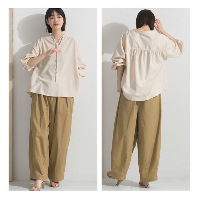 日本 OMNES - 柔滑科技棉 俐落感綁帶澎袖上衣-白