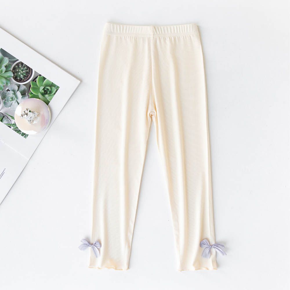 莫代爾透氣九分內搭褲-立體蝴蝶結-米杏色