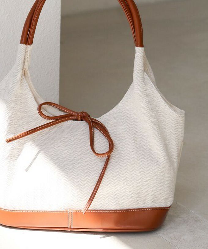 日本 Bab - 異素材成熟感蝴蝶結氣質手提包-藍x黑