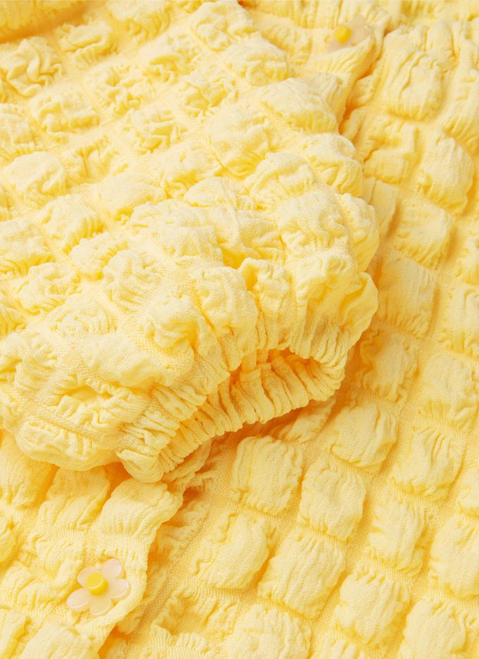 韓國 OZKIZ - 棉花糖立體紋花朵鈕扣外套-象牙白