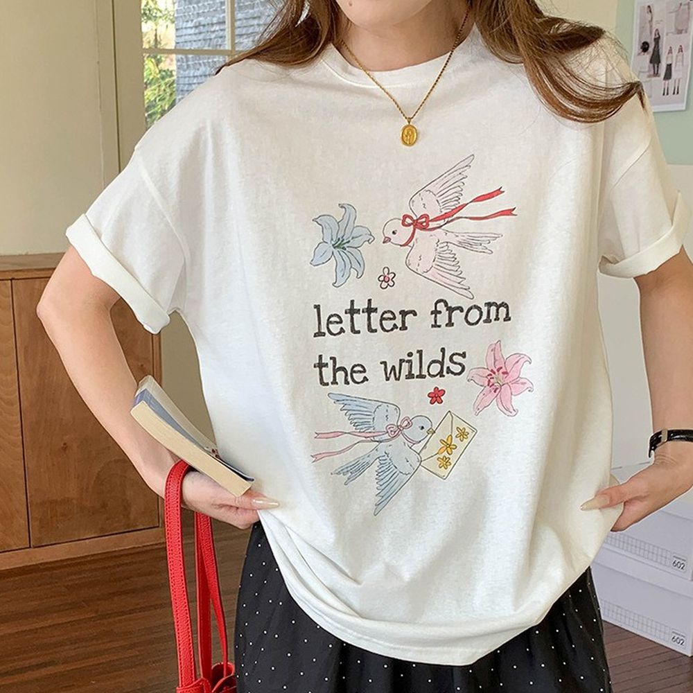 寬鬆落肩短袖上衣-手繪風花野來信-白 (F)