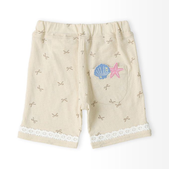 日本 ZOOLAND - 滿版蝴蝶結蕾絲滾邊短褲-貝殼口袋-米杏
