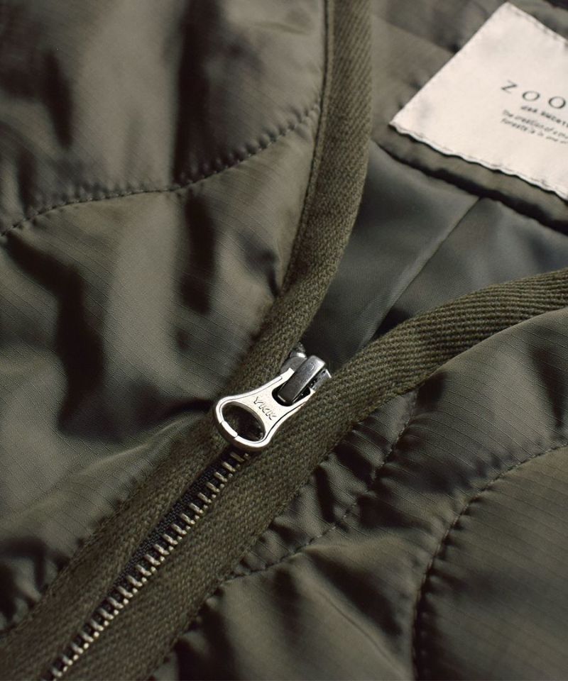 日本 zootie - SunnyHeat 防潑水蓄熱保暖長版背心-黑