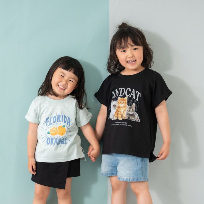 日本 petit main - 100%棉 開衩印花短袖上衣-英文logo-米杏