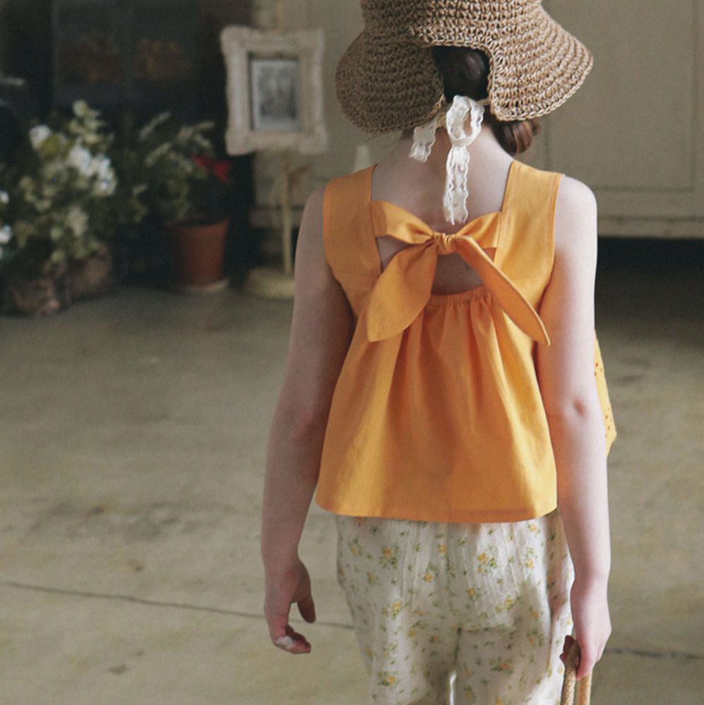 韓國 PuellaFLO - 後背蝴蝶結鏤空雕花上衣-橘