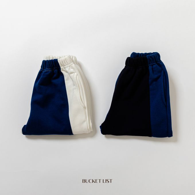 韓國 BUCKET LIST - 鬆緊腰撞色休閒縮口長褲-象牙白X深藍