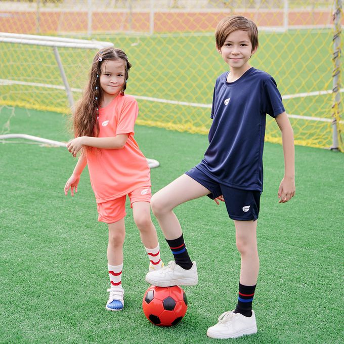 GIAT - 兒童盾形排汗短袖上衣-亮桔(螢光色)