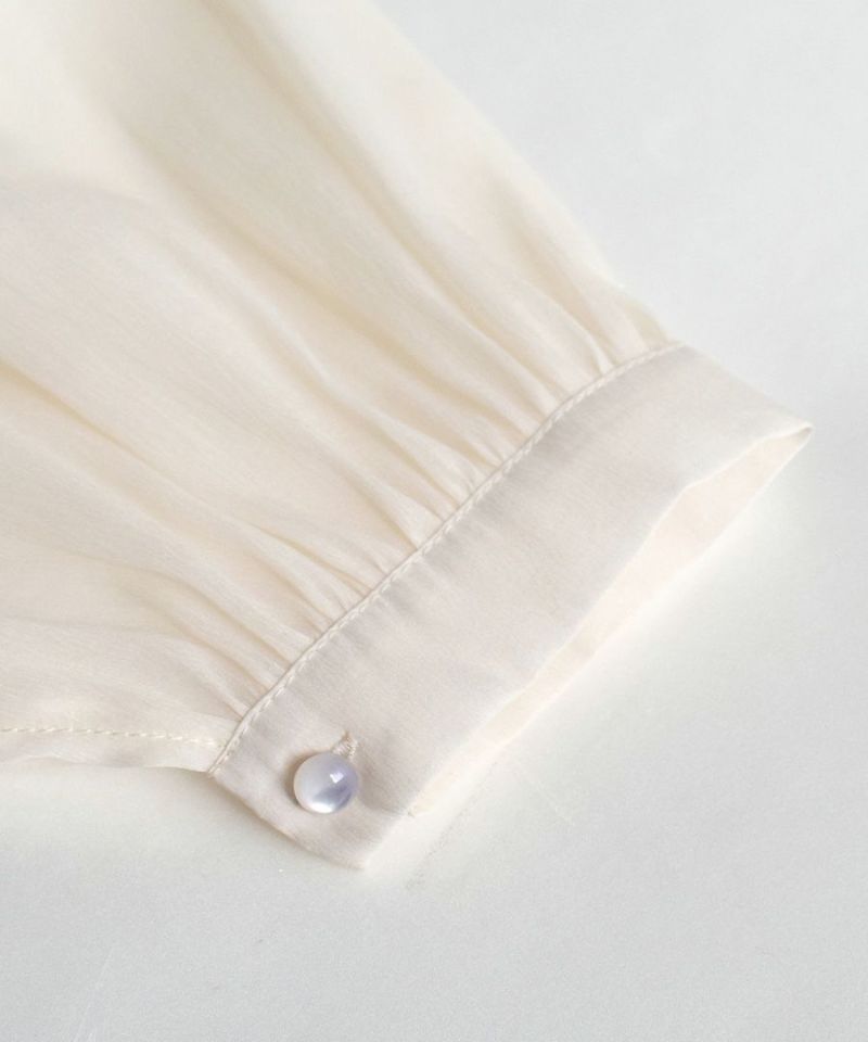 日本 zootie - 空氣感透膚優雅泡泡袖上衣-焦糖棕