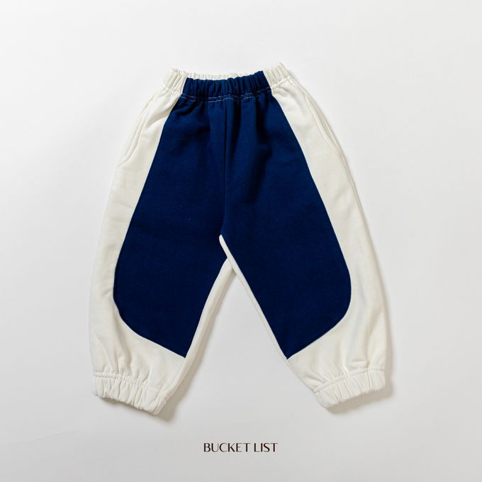 韓國 BUCKET LIST - 鬆緊腰撞色休閒縮口長褲-象牙白X深藍