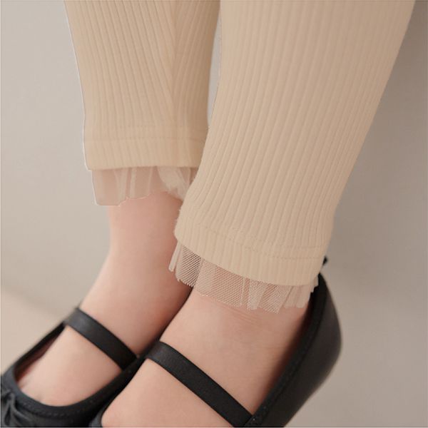 日本 Lycee mine - 下擺薄紗點綴羅紋9分內搭褲-卡其