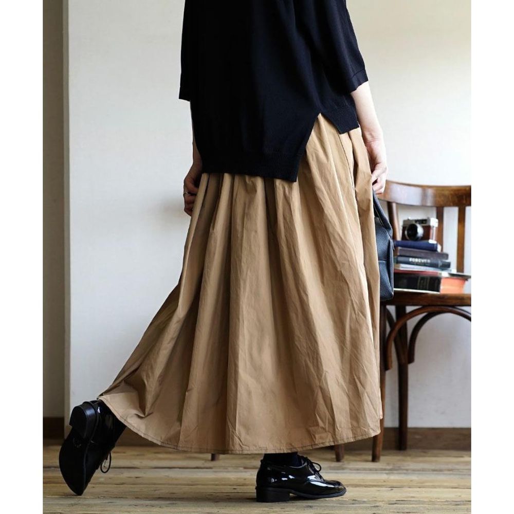 日本 zootie - 低調光澤修身顯瘦長裙-卡其