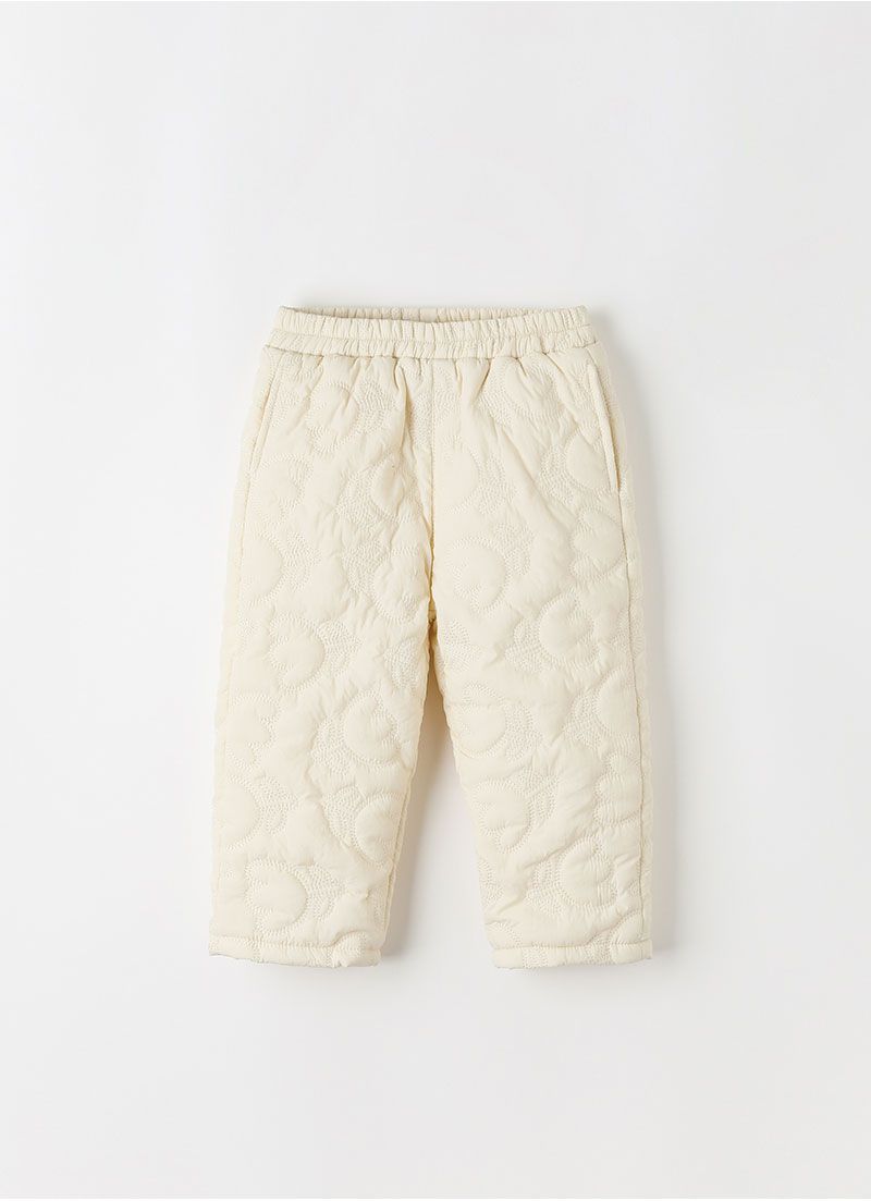 韓國 OZKIZ - 鬱金香縫紋內磨毛長褲-米白