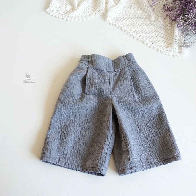 韓國 Jmsnail - 鬆緊腰鈕扣裝飾壓紋長褲-淺卡其