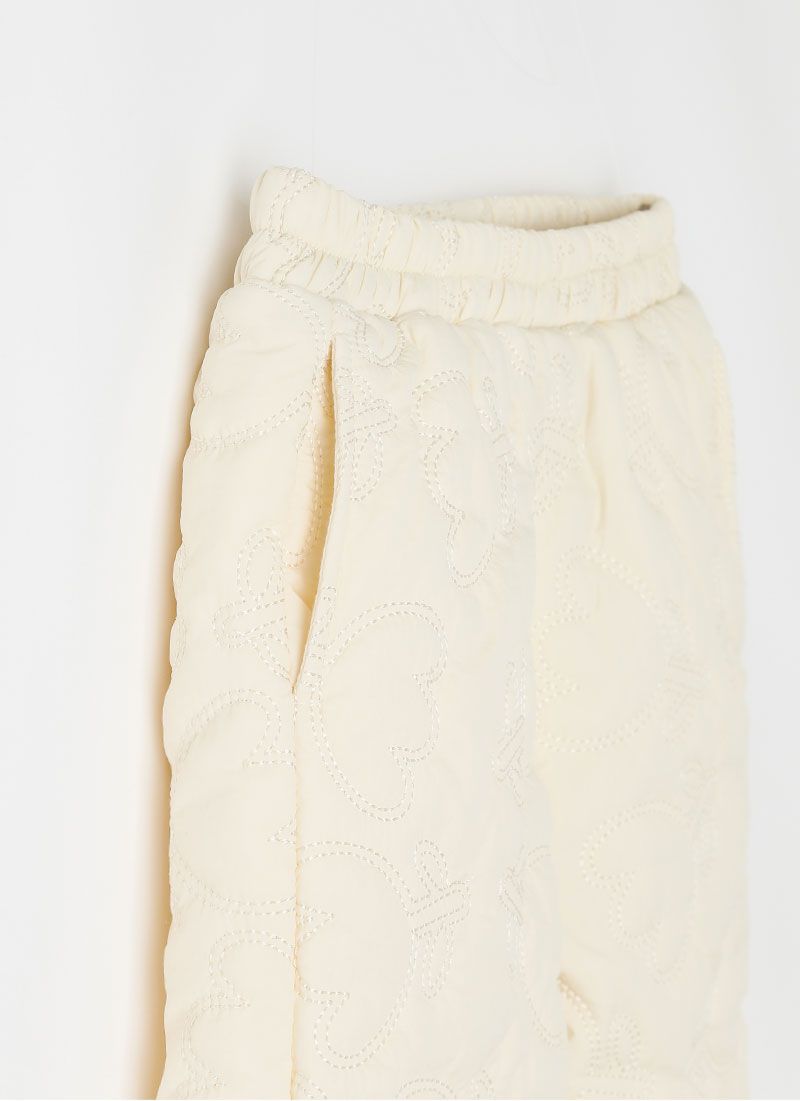 韓國 OZKIZ - 鬱金香縫紋內磨毛長褲-米白