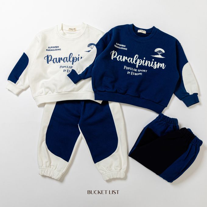 韓國 BUCKET LIST - 鬆緊腰撞色休閒縮口長褲-象牙白X深藍