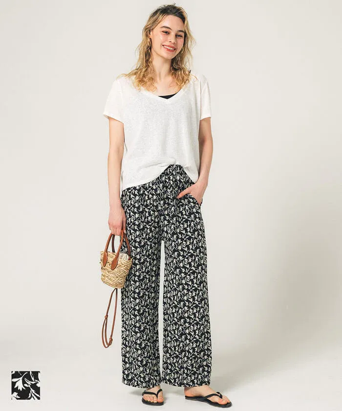 日本 COCA - 透氣印花修身寬褲-百合碎花-黑