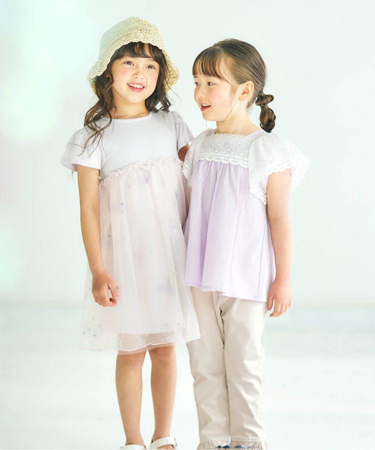 日本 apres les cours - 雛菊刺繡口袋下擺荷葉休閒九分褲-丹寧藍