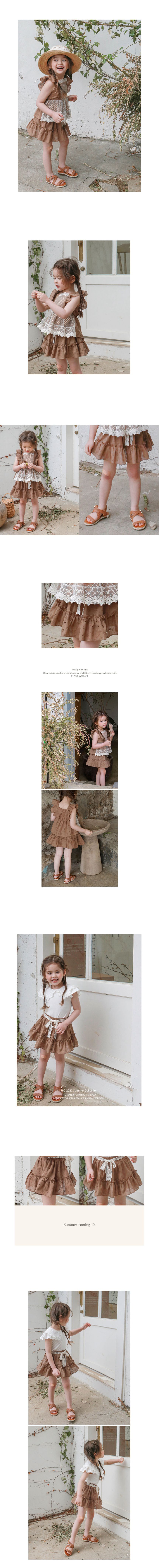 韓國 Puellaflo - 雕花鏤空荷葉拼接短褲裙-可可咖