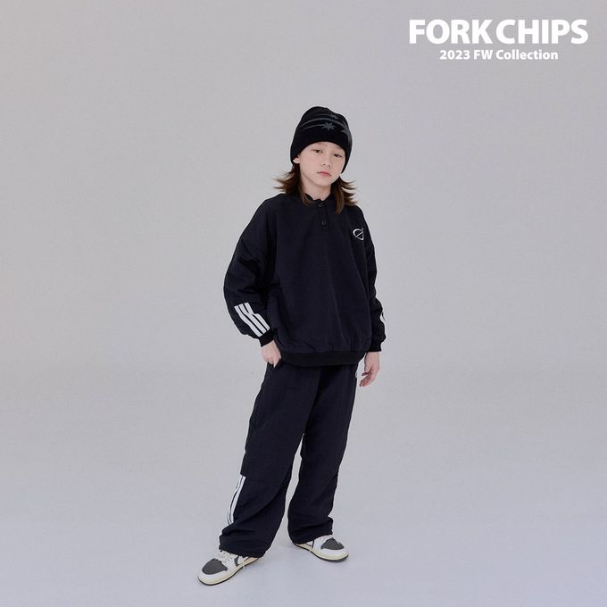 韓國 FORK CHIPS - 鬆緊腰穿越星星防風休閒長褲-黑