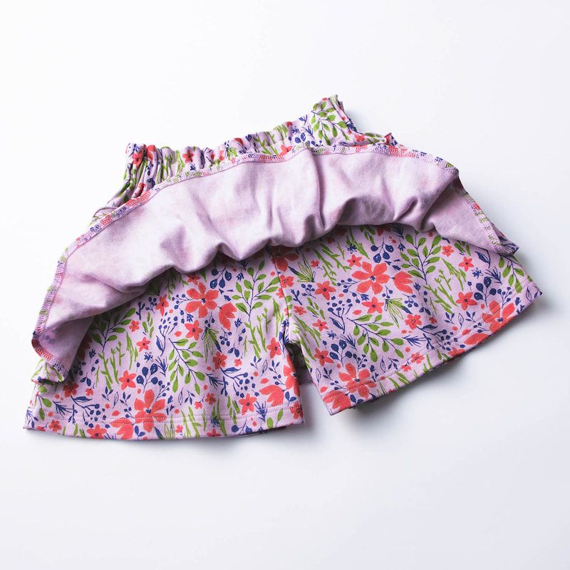 日本千趣會 - 碎花波浪純棉百摺褲裙-紫粉色系