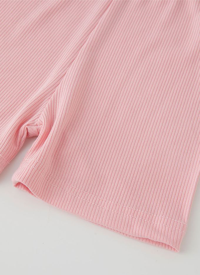 韓國 OZKIZ - 簡約純色彈性內搭短褲-鵝黃