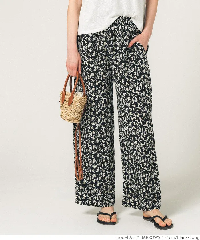 日本 COCA - 透氣印花修身寬褲-百合碎花-黑
