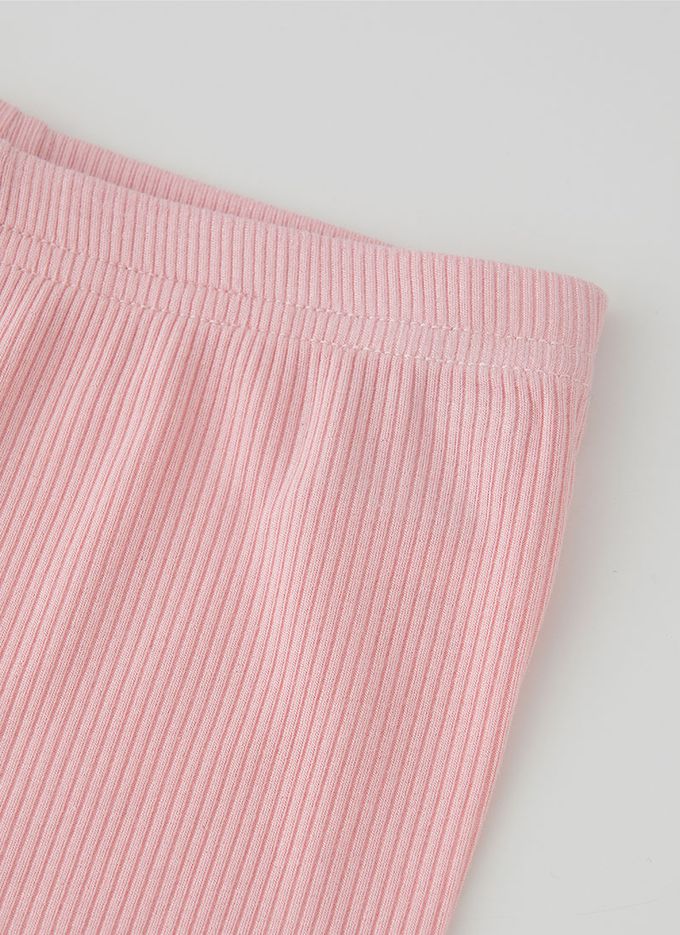 韓國 OZKIZ - 簡約純色彈性內搭短褲-鵝黃