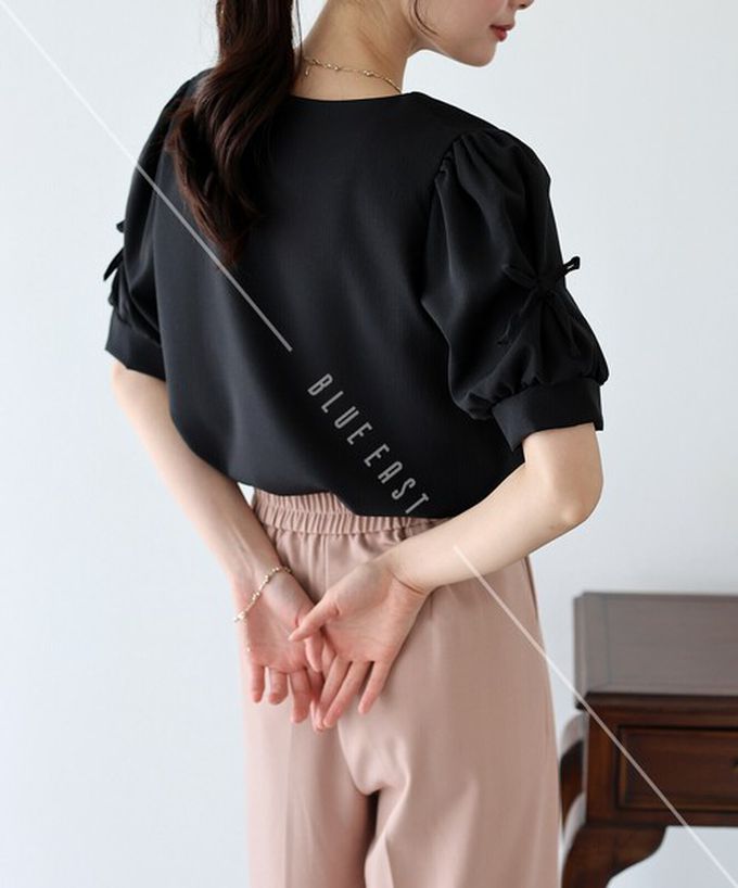 日本 BLUE EAST - 甜美可愛蝴蝶結點綴短袖上衣-水藍 (M)